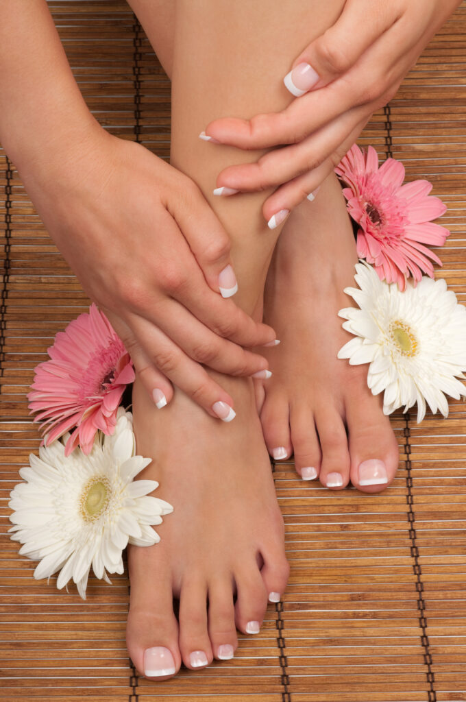Pedicure and manicure spa with beautiful flowers
